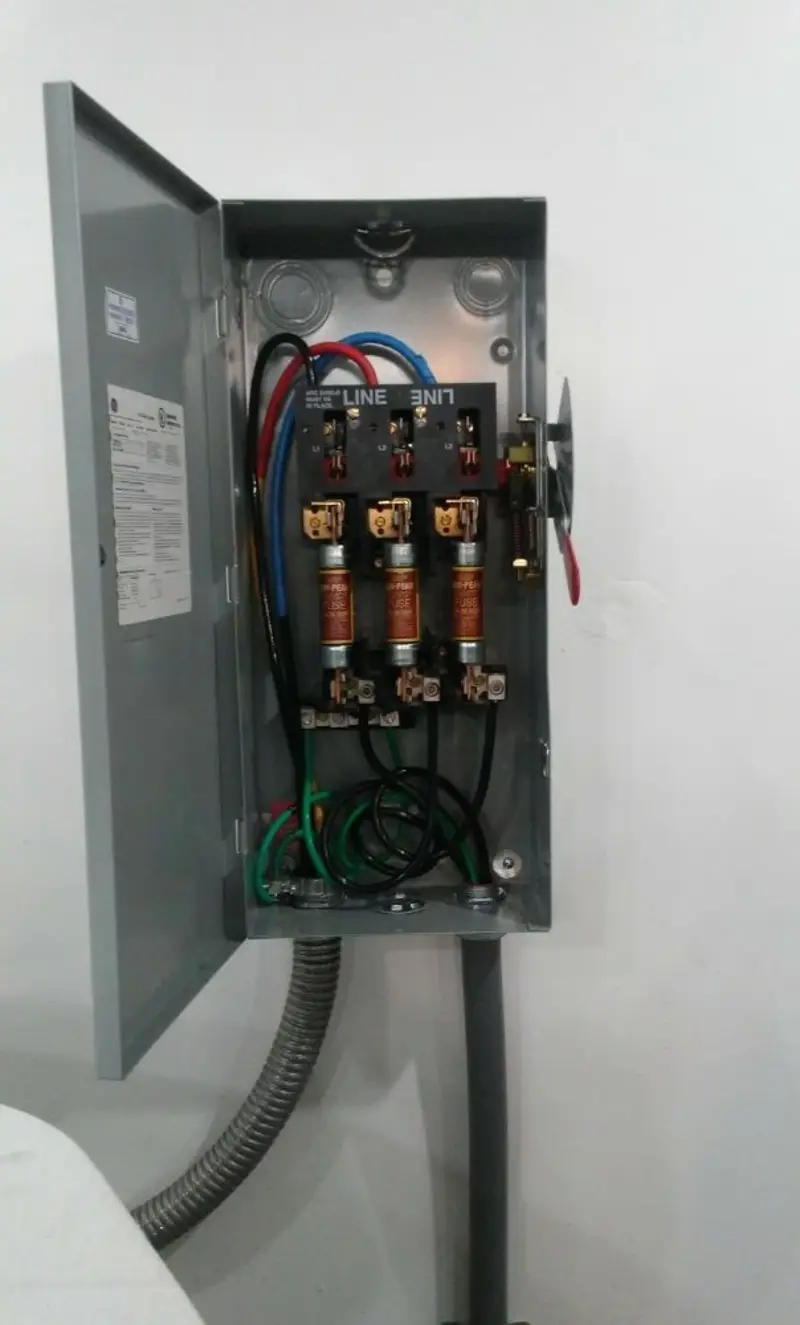 Three-phase disconnect switch installed for Smoke Detector Installation in Suncoast Estates